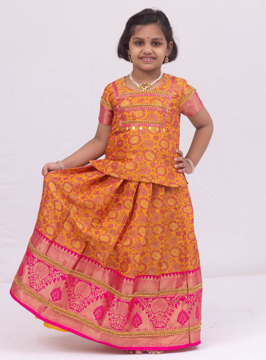 Yellow -Pink banarasi jacquard brocade  Parkar Polka set with a heavy yoke pattern for Girls.Let your princess be as comfortable as in her casuals with carefully designed & crafted Comfort Ethnic Wear by Soyara Ethnics.Keep her fashion quotient high with timeless patterns, vibrant combinations and royal textiles.