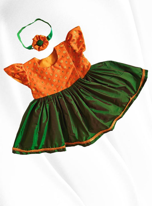 Yellow brocade with bottle green  silk front open flared newborn baby girl frock for naming ceremony with bonnet,bloomer & booties.It's the perfect outfit for your naamkaran or annaprashan ceremony.Traditional dress for Noolukettu Ceremony,Pachavi Puja,cradle ceremony,Rice Ceremony,Chatti Puja etc.Apt gifting idea 