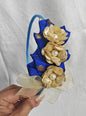 This Royal blue headband for girls features delicate fabric flowers and is handcrafted with great care. It is ideal for girls over the age of 2 and makes a lovely addition to any outfit.