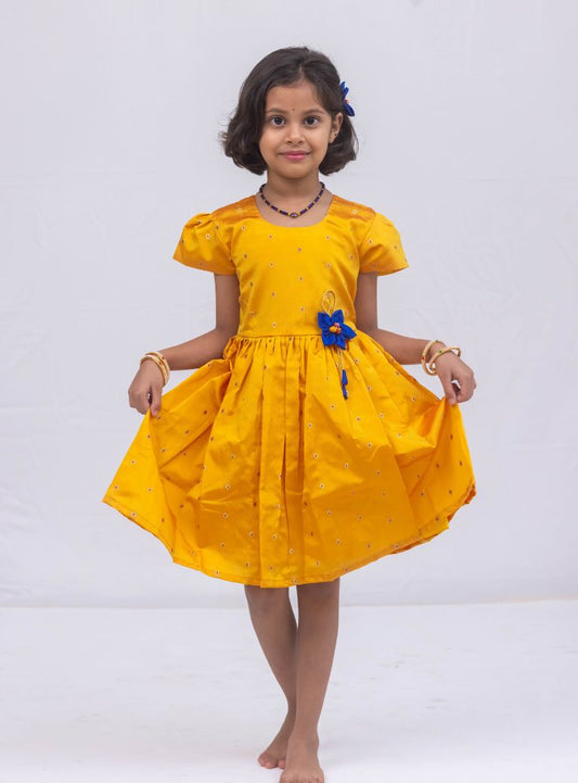 Yellow taffeta silk dress with puff sleeves and a handmade fabric flower brooch for Girls