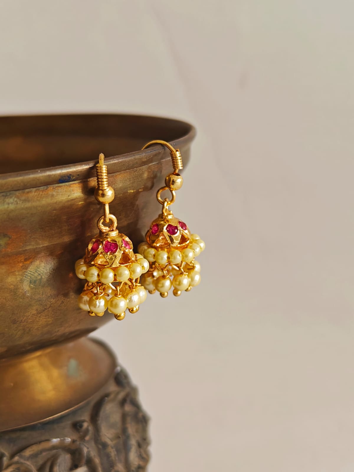 Pearls Jhumka - small size. Gold plated copper and silver alloy, make these jhumkas stay shiny as new for years. A must have piece of jewellery for a little girl. Adorn your princess with head to toe premium quality handcrafted accessories made from allergy free, best quality materials.