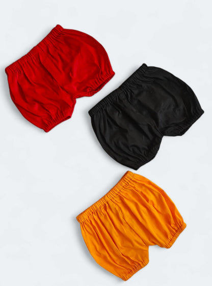 Set of 3 common coloured Baby Bloomers to use over a diaper for Newborn.Golden brocade bonnet,paithani booties,fabric headbands all these Handcrafted accessories for Newborn are perfect add ons to any traditional attire of the baby. Designer baby mats, set of generic bloomers are the other naming ceremony essentials.