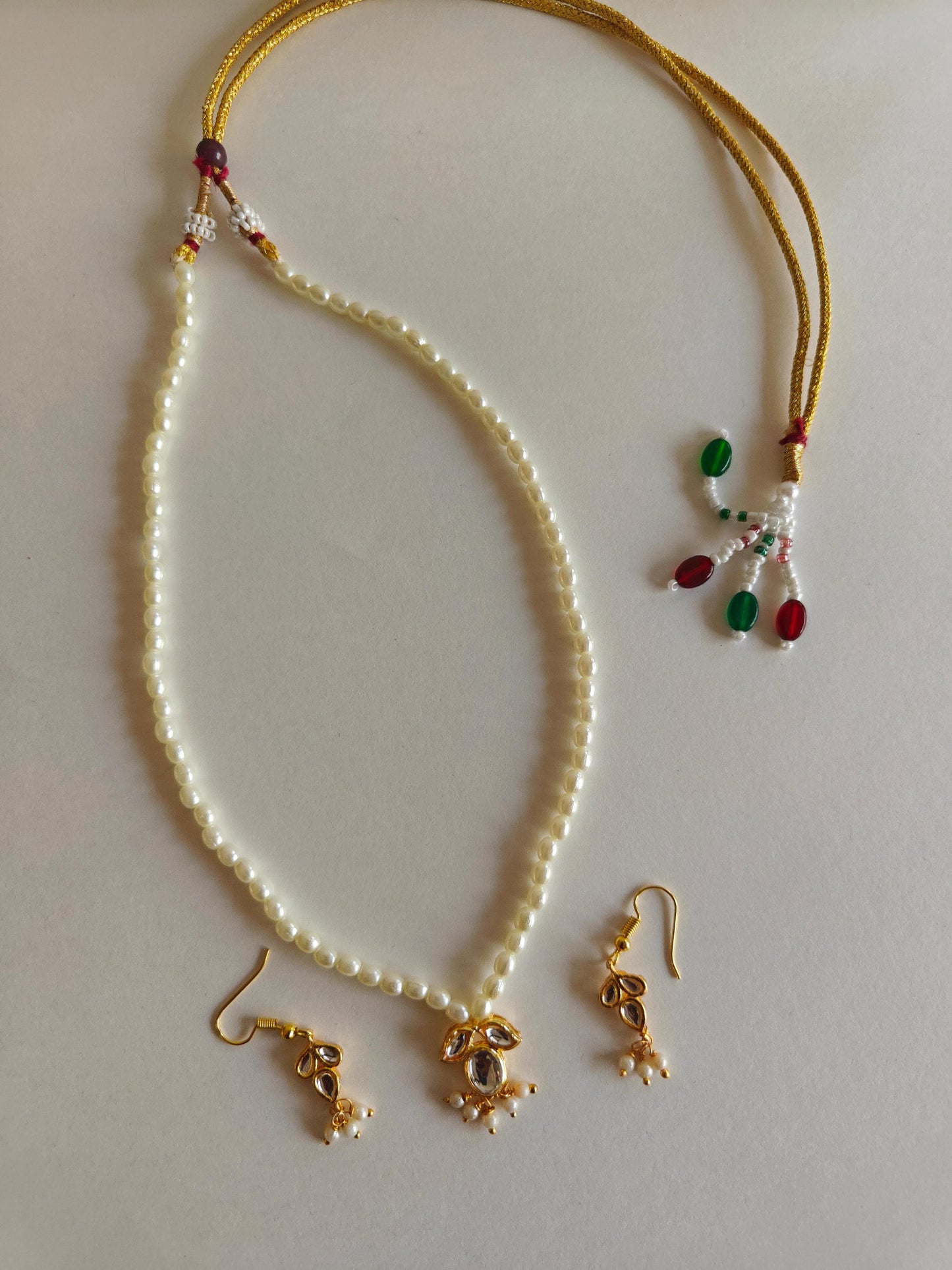 Mukta Set - Pearl chain necklace with Kundan pendant stringed pearls necklace with leaf shaped kundan studded pendant and matching earrings for Girls