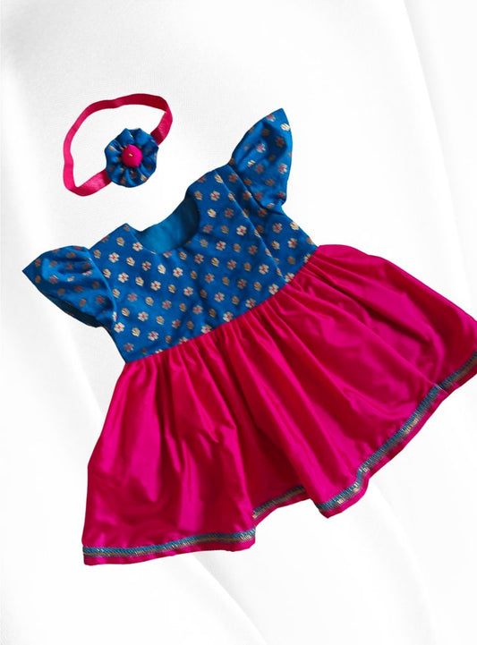 Blue brocade with rani pink malai silk front open flared newborn baby girl frock for naming ceremony with bonnet,bloomer & booties.It's the perfect outfit for your naamkaran or annaprashan ceremony.Traditional dress for Noolukettu Ceremony,Pachavi Puja,cradle ceremony,Rice Ceremony,Chatti Puja etc.Apt gifting idea