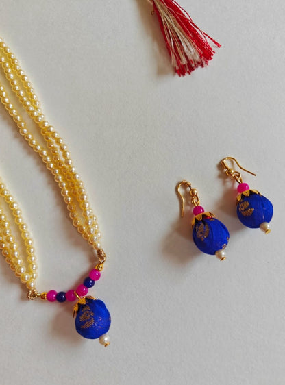 Royal blue brocade fabric pendant and triple layered pearls necklace in combination with royal blue and pink glass beads for Girls
