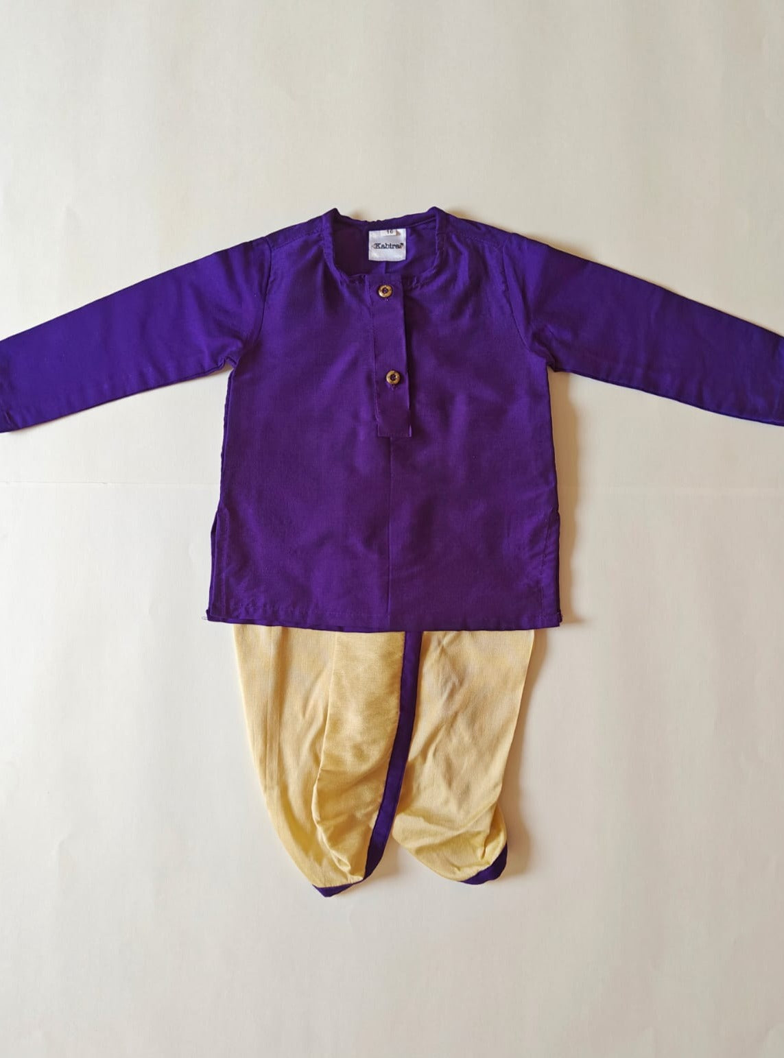Purple cotton silk round neck kurta, Golden cotton silk dhoti with Tussar silk Jacket for Baby Boy.It's the perfect outfit for your baby's naming ceremony,naamkaran,annaprashan ceremony.Traditional dress for Noolukettu Ceremony,Pachavi Puja,cradle ceremony,Rice Ceremony,Chatti Puja etc. Apt gifting idea