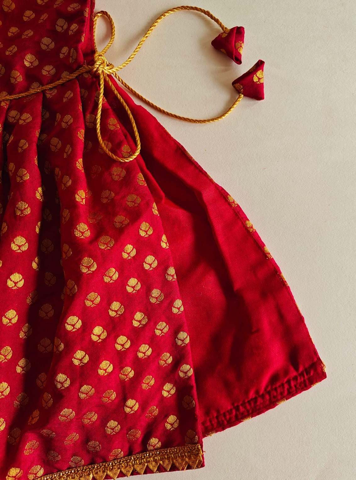 Maroon brocade silk kunchi with beautiful golden lace for New Born