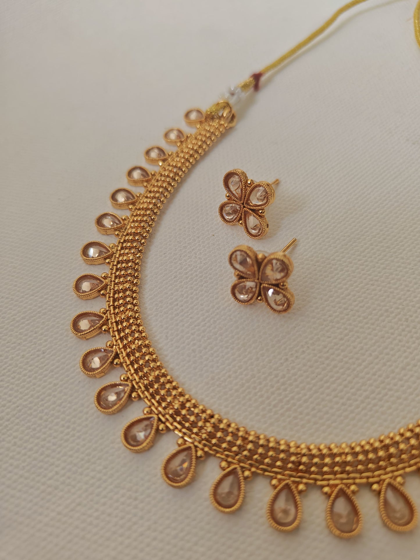 Kundan studded choker with matching earrings for Girls