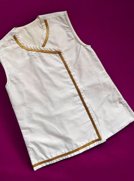 Batu's white cotton silk sleeveless vest is designed with a front open style and features elegant golden lace accents. The vest includes a soft cotton lining for comfort during ritual performances.