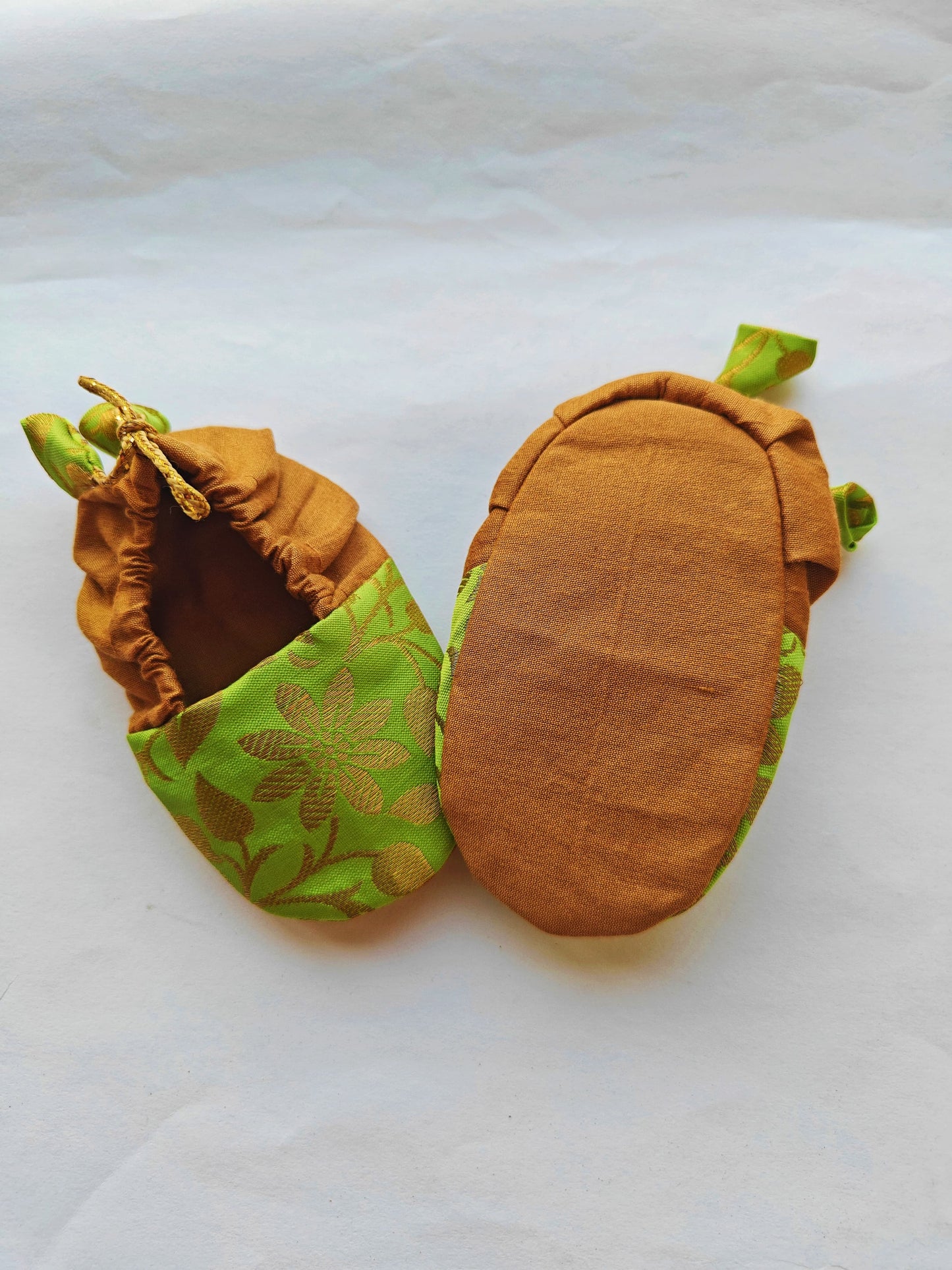 Parrot Green and Golden Brocade unisex booties for newborn baby