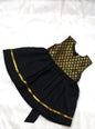 Brocade bodice with plain black bottom highlighted with golden border for girls