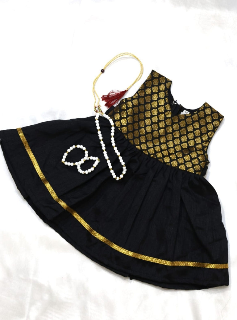 Brocade bodice with plain black bottom highlighted with golden border for girls