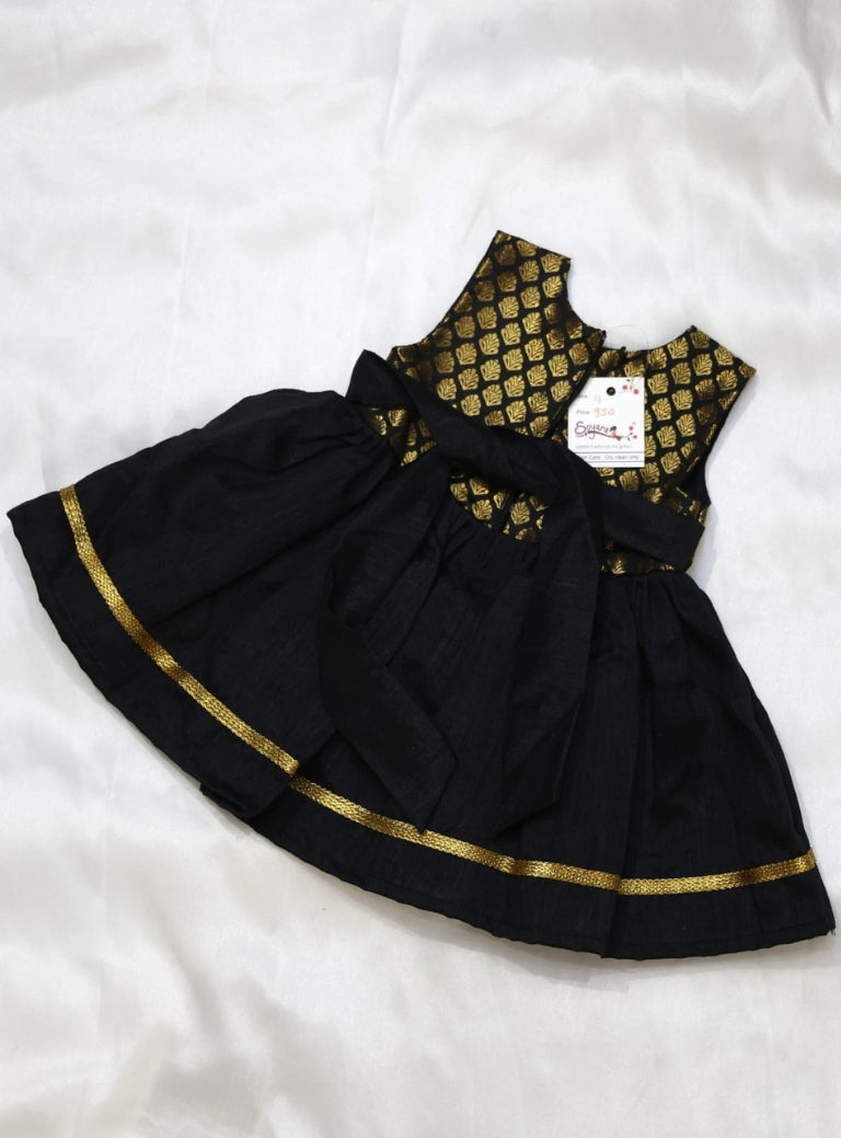 Brocade bodice with plain black bottom highlighted with golden border for girls