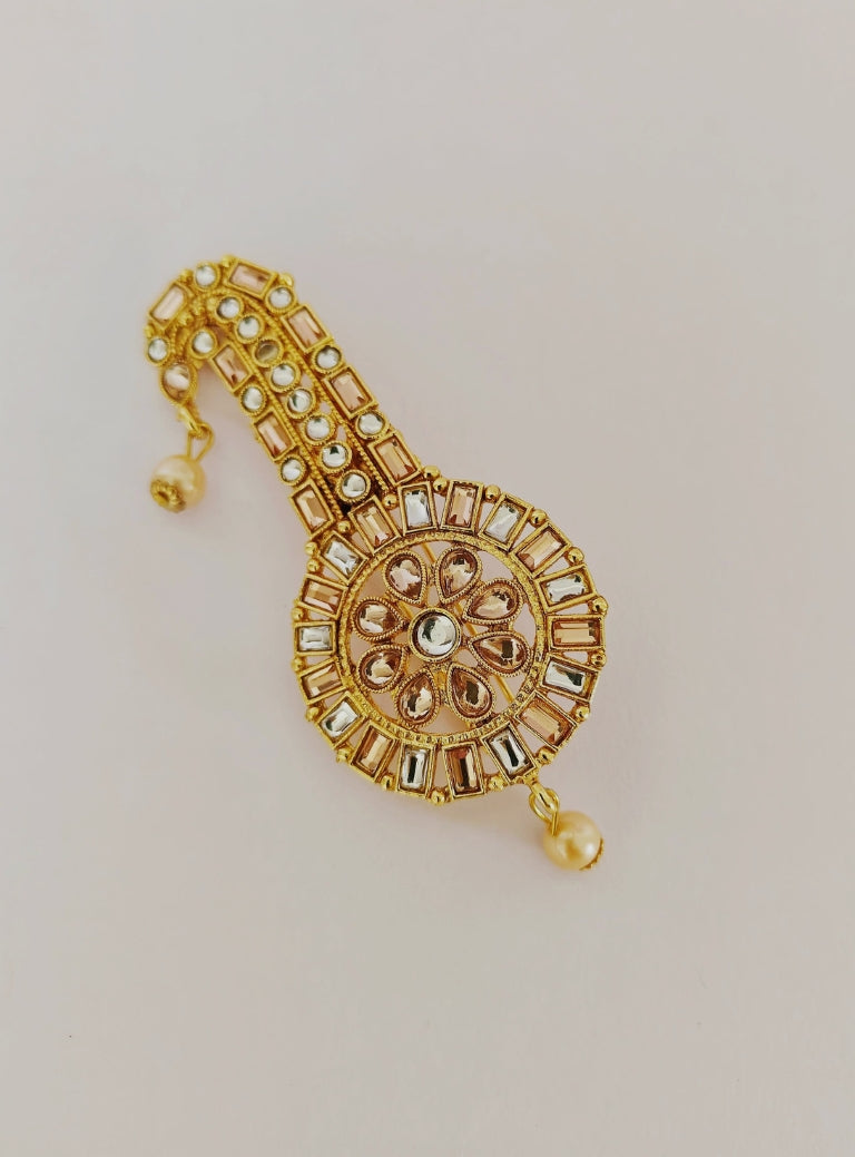 Golden and white stones studded round  shaped kalangi / pagadi brooch for batu or groom.