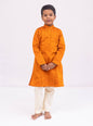 Rust colored Knife pleated raw silk stand collar kurta with jari buttas for Boys