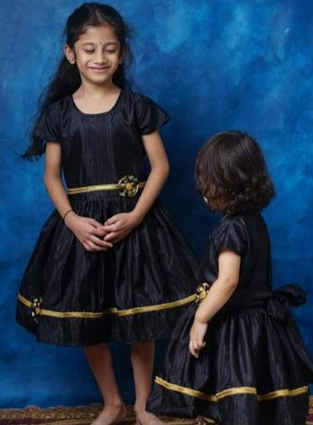 Celebrate Sankrant in style with our elegant black ethnic wear for boys and girls. Crafted from luxurious silk brocade and Chanderi fabrics, this collection blends tradition with modern charm. Perfect for the Makar Sankrant festival ! 