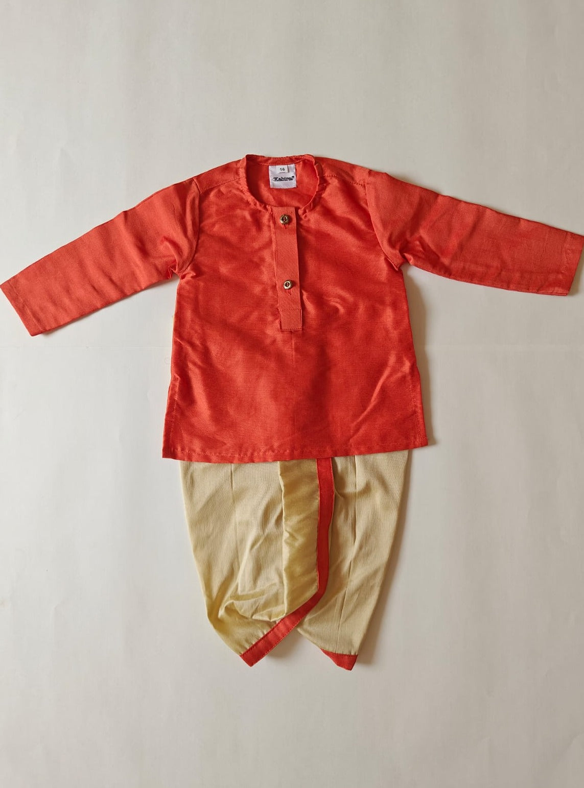 orange cotton silk round neck kurta, Golden cotton silk dhoti with Tussar silk Jacket for Baby Boy.It's the perfect outfit for your baby's naming ceremony,naamkaran,annaprashan ceremony.Traditional dress for Noolukettu Ceremony,Pachavi Puja,cradle ceremony,Rice Ceremony,Chatti Puja etc. Apt gifting idea