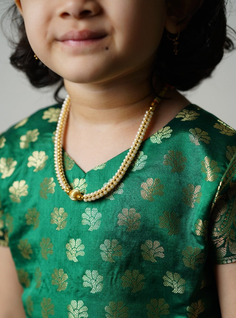 Leaf Green banarasi brocade dress with woven jari borders for Girls.Let your princess be as comfortable as in her casuals with carefully designed & crafted Comfort Ethnic Wear by Soyara Ethnics.Keep her fashion quotient high with timeless patterns, vibrant combinations and royal textiles.