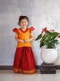 Red handloom cotton khunn long Ghagra with pine silk blouse with beautiful flower motifs.Let your princess be as comfortable as in her casuals with carefully designed & crafted Comfort Ethnic Wear by Soyara Ethnics.Keep her fashion quotient high with timeless patterns, vibrant combinations and royal textiles.