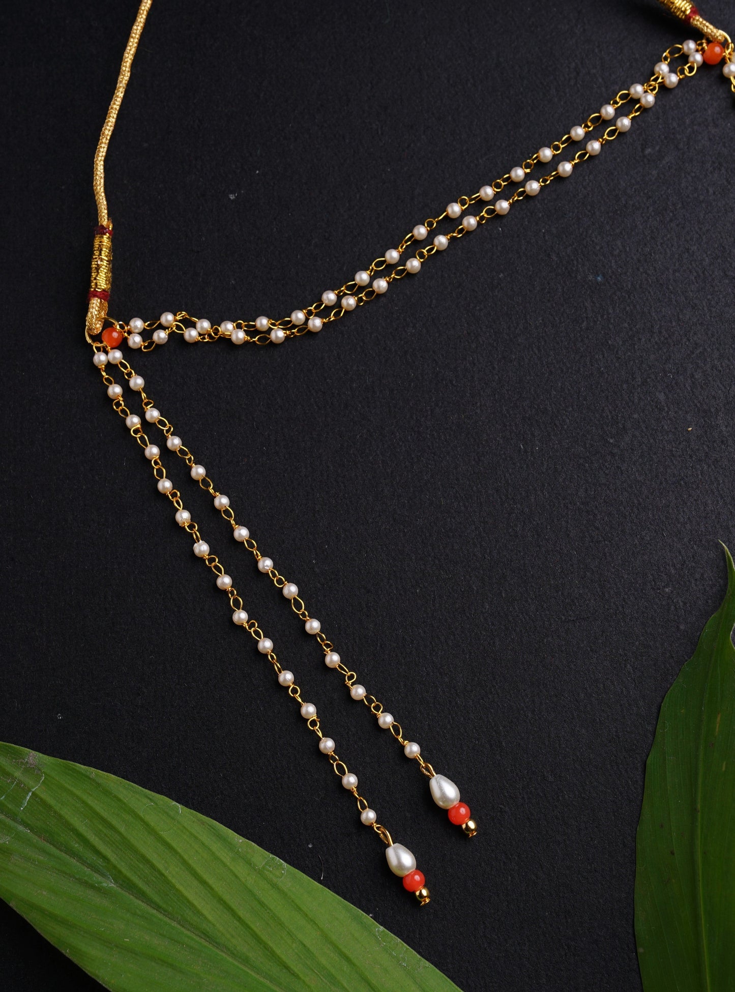 Mundavalya is a forehead ornament worn by Batu for Vratabandh/Munj/Upnayan/ Thread Ceremony. Mundavalya,kanthi,bhikbali,topi,pagdi are boys accessories exclusively designed using Pearls,glass beads,jadau & gold plated findings for Batu,for Upanayan/Vratabandha/munj /thread ceremony. 