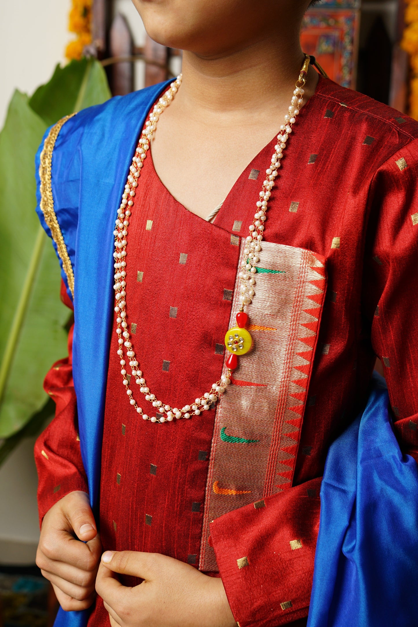 Deep red colored bhagalpuri silk with jari butta Round neck Kurta.Kurtas with collar or Angarakha pattern teamed with salwar are the best choice for any festive occasion for boys.They are Trendy, Easy to wear and comfortable to carry.