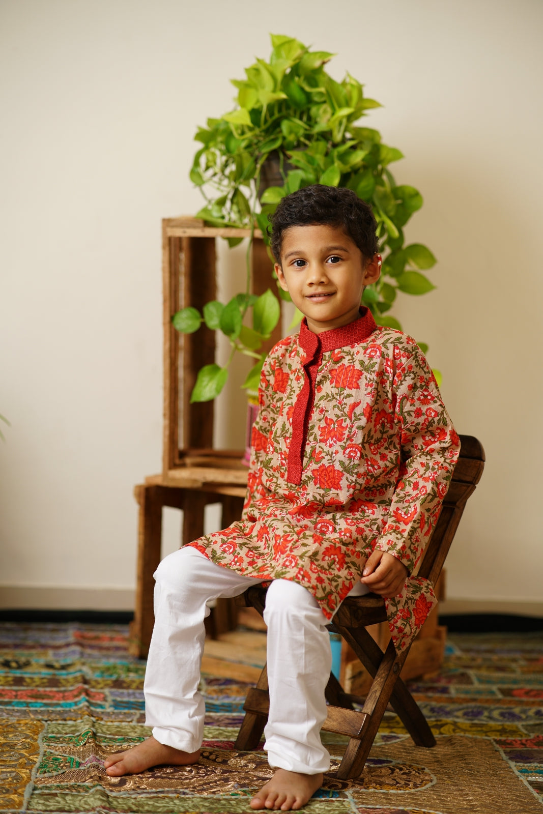 Sanganeri Cotton block printed Stand Collar Kurta with silver jari weaved lines.Kurtas with collar or Angrakha pattern teamed with salwar are the best choice for any festive occasion for boys.They are Trendy, Easy to wear and comfortable to carry.